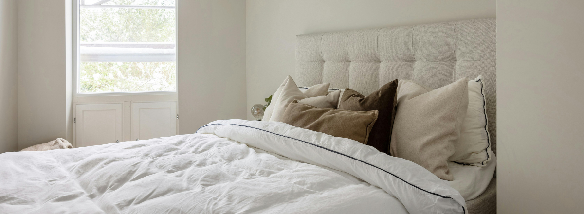 Hoe een hoesloos dekbed kan bijdragen aan een betere nachtrust tijdens warmere seizoenen?