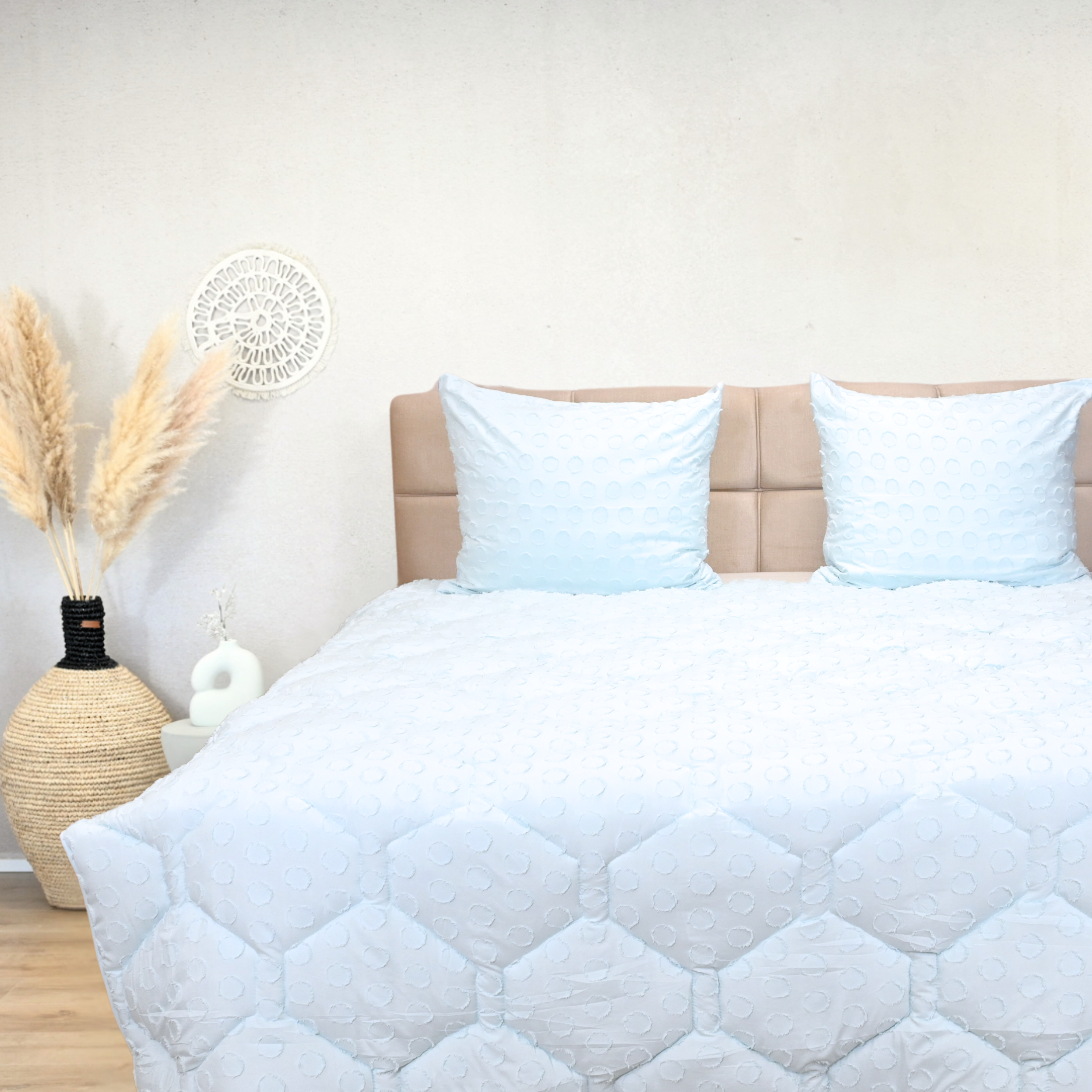 Ice Blue HappyBed Tufted duvet on bed, soft and hypoallergenic.