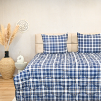HappyBed Tartan all-season comfortable duvet with plaid design on a neatly made bed.