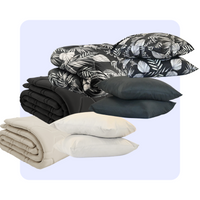 HappyBed Bestseller Bundle set of three year-round duvets and pillowcases in Black Leaves, Taupe, and Black colors