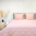 Cozy pink HappyBed Wafel duvet, perfect for year-round comfort, made of 100% cotton.