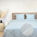 HappyBed Mousseline dekbed lichtblauw voor het hele jaar, ademend, hypoallergeen en sneldrogend.