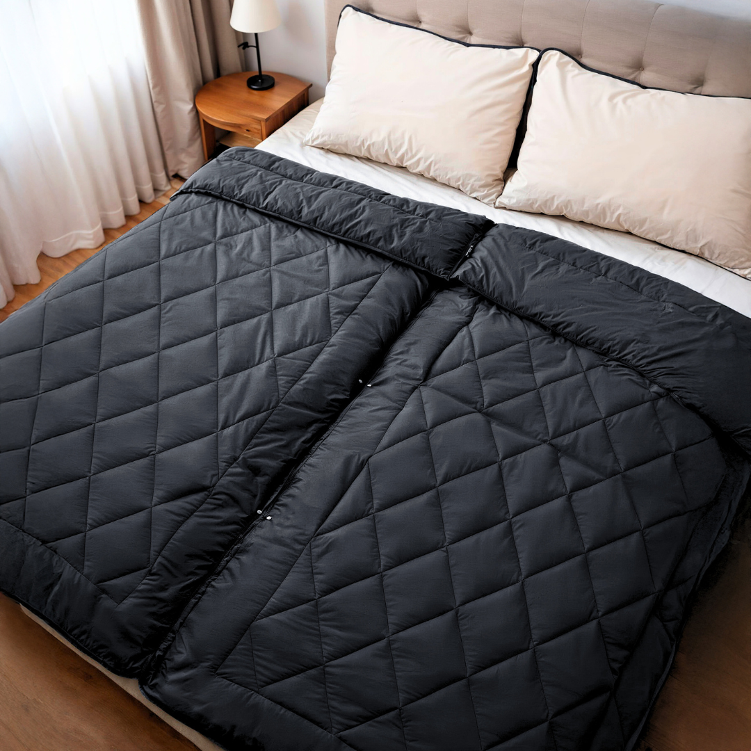 Happybed Black partnerdekbed with adjustable dual sides for all seasons, featuring washable cover and press buttons for customization.