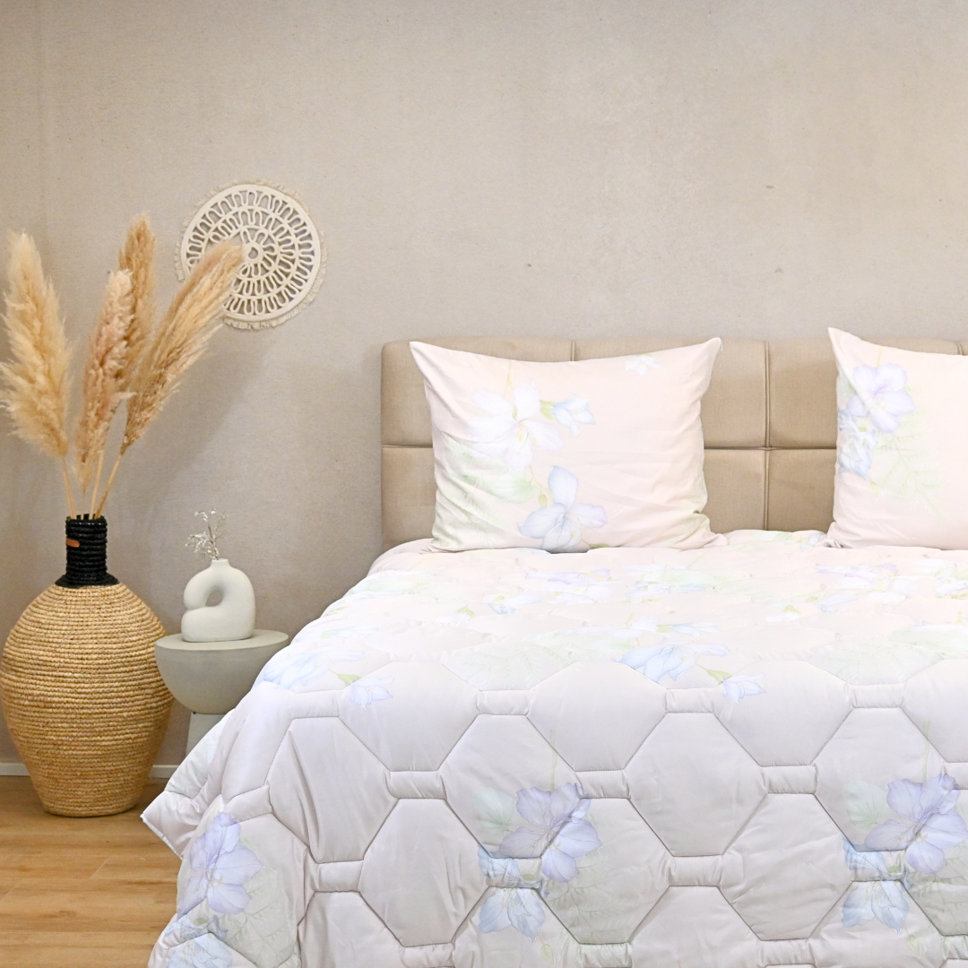 Versatile pastel floral duvet for year-round comfort with hypoallergenic, quick-dry features.