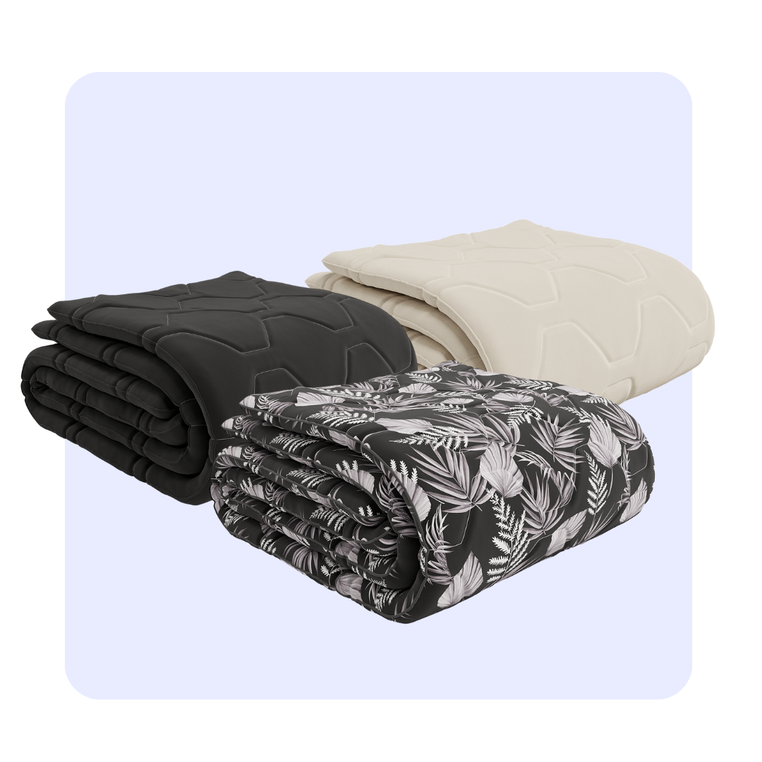 HappyBed Bestseller Bundle of 3 duvet covers in Taupe, Dark Blue, and Black Leaves designs.
