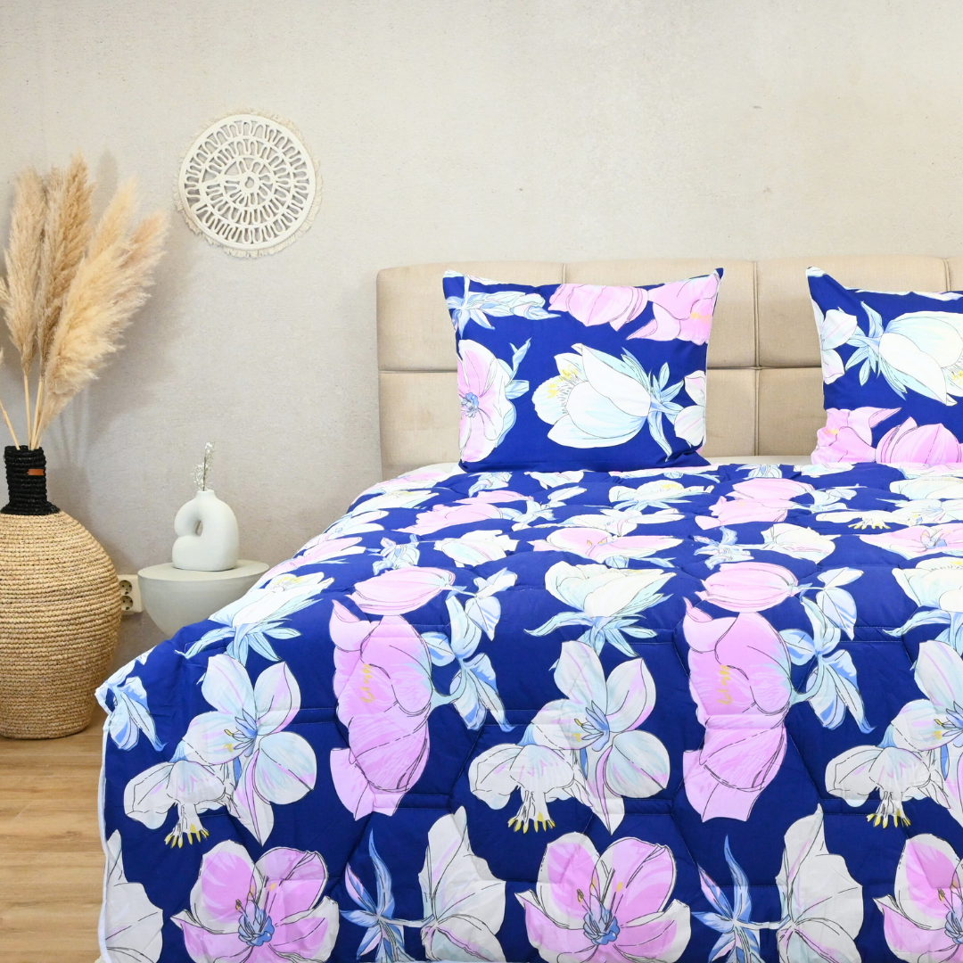 HappyBed Purple Bloom duvet cover on bed with floral design, 100% cotton, suitable for year-round comfort.