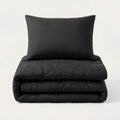 HappyBed wasbare kinderdeken zwart met voetbal WM-thema en bijpassend kussen 60x70 cm