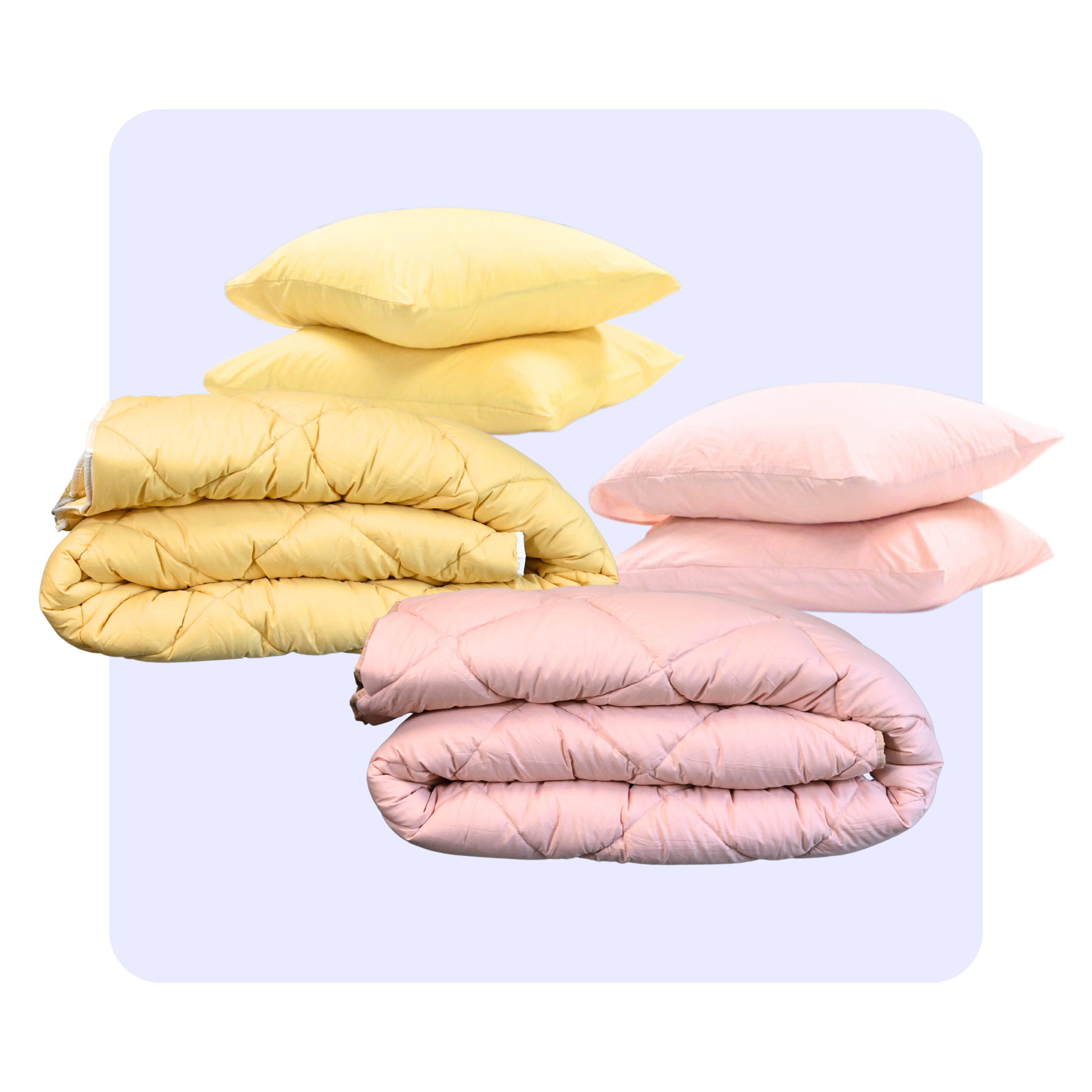 HappyBed Premium Set of two percale cotton duvets with matching pillowcases in yellow Sevilla Sunset and pink Vintage Pink colors.