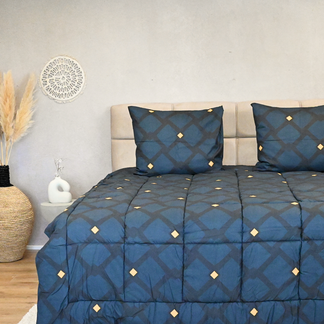 HappyBed Blue Mosaic all-season duvet with included pillowcases on bed.