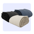 HappyBed 4-Seizoenen Bundle adjustable comfort duvets in black, taupe, and dark blue.